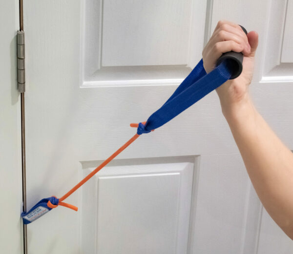 A person holding a RangeMaster Handle for Tubing and Banding (10 Pack) with a blue and orange lanyard.
